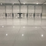 Airplane hangar facility floor coatings