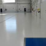 Aircraft facility flooring coatings